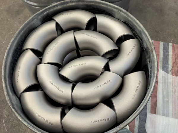 艾瑞镁金属为客户定制的一批钛弯头即将发货交付